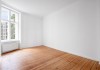 White,Room,In,Empty,Flat,With,Window,And,Wooden,Floor